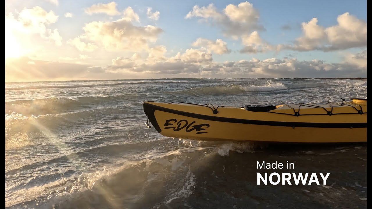 Kayak surfing on a smooth December day at Jæren