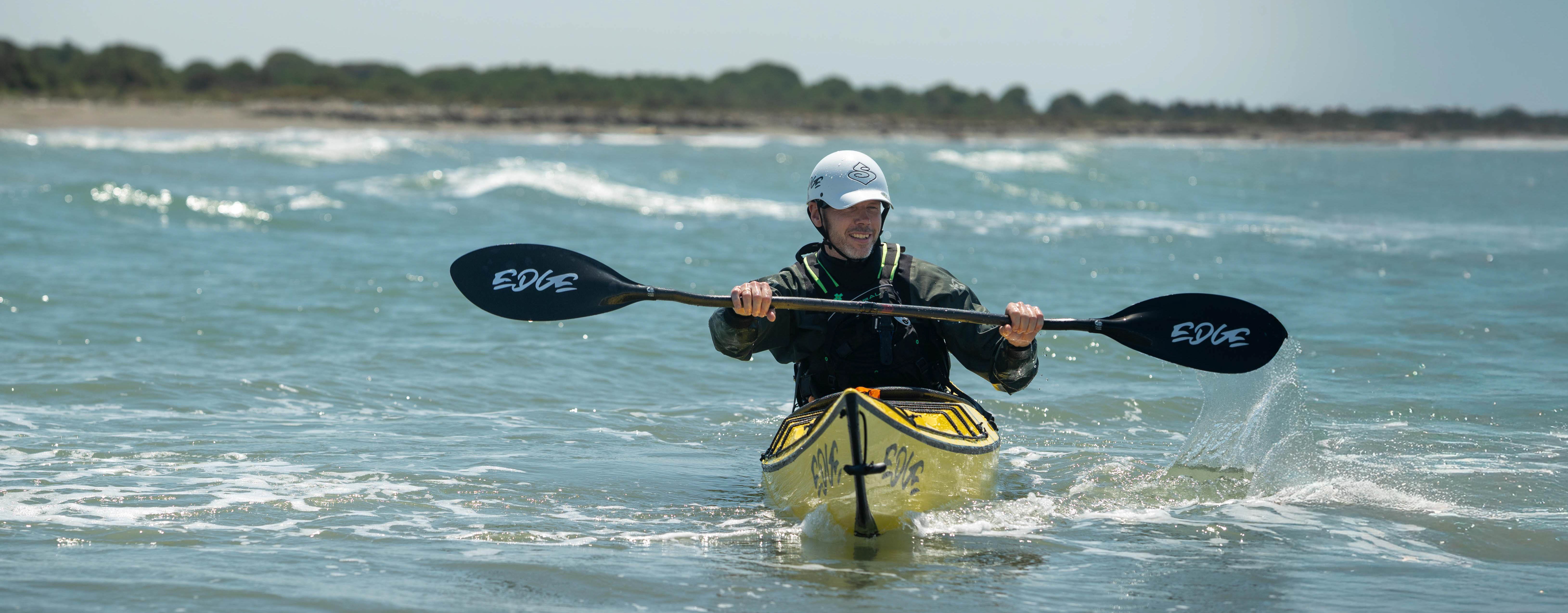 An Edge Alnes paddler coming ashore